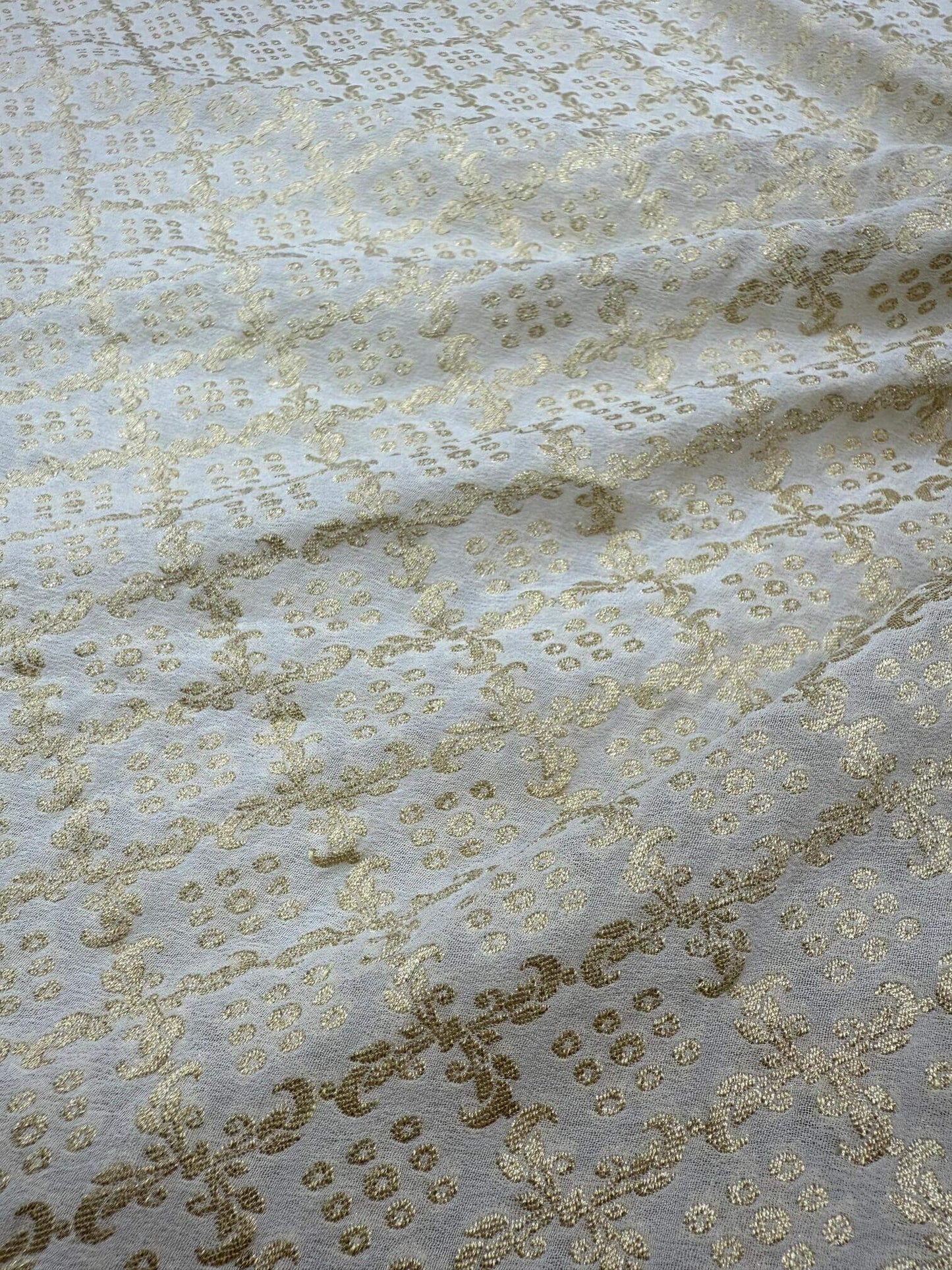 KHADDI GEORGETTE BANDHANI JAAL FABRIC WITH WATER ZARI - DYEABLE