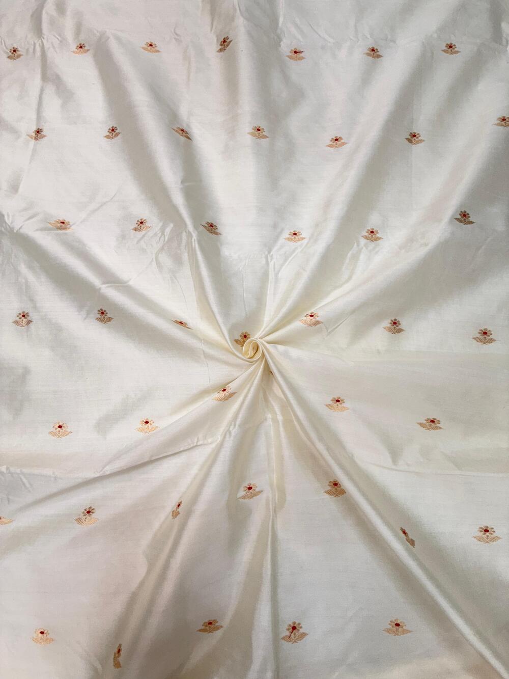 HANDLOOM CHINIYA SILK FABRIC – IVORY CREAM (KADHUWA BOOTA, GOLDEN ZARI WITH MEENAKARI, DYEABLE – PER METER)