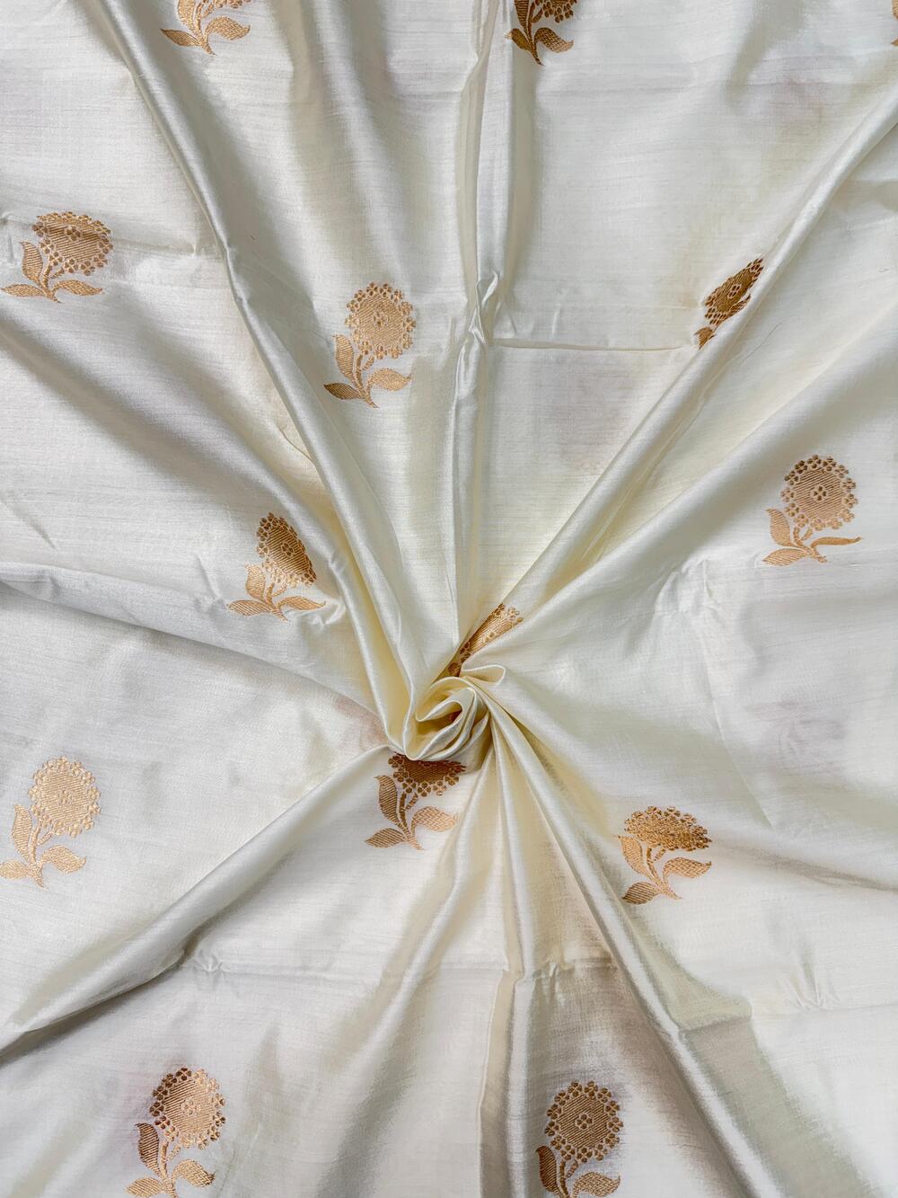 HANDLOOM CHINIYA SILK FABRIC – IVORY CREAM (KADHUWA BOOTA, GOLDEN ZARI WEAVE, DYEABLE, PER METER)