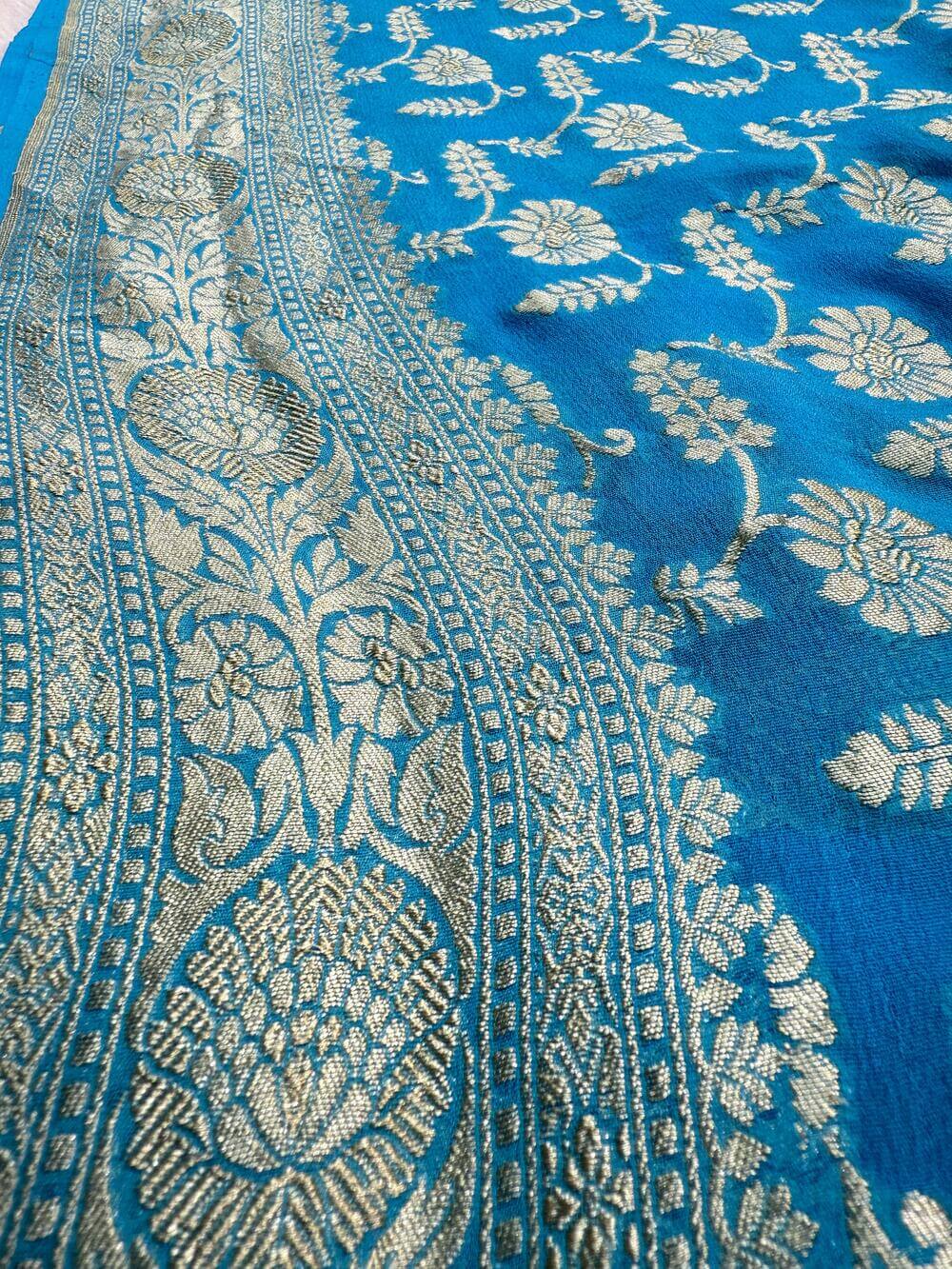KHADDI GEORGETTE CHIFFON SILK HANDLOOM SAREE – LIGHT FIROZI (ALL OVER JAAL, HANDWOVEN)