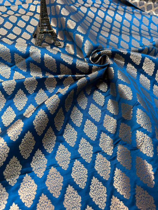 SATIN BROCADE BOOTA FABRIC – PEACOCK BLUE (ZARI SILK WEAVE, PER METER)