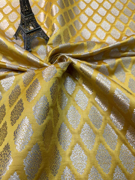 SATIN BROCADE BOOTA FABRIC – YELLOW GOLD HALDI (ZARI SILK WEAVE, PER METER)