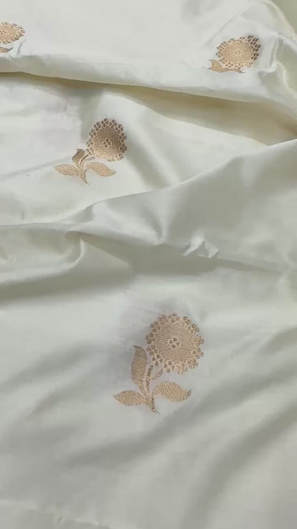 HANDLOOM CHINIYA SILK FABRIC – IVORY CREAM (KADHUWA BOOTA, GOLDEN ZARI WEAVE, DYEABLE, PER METER)